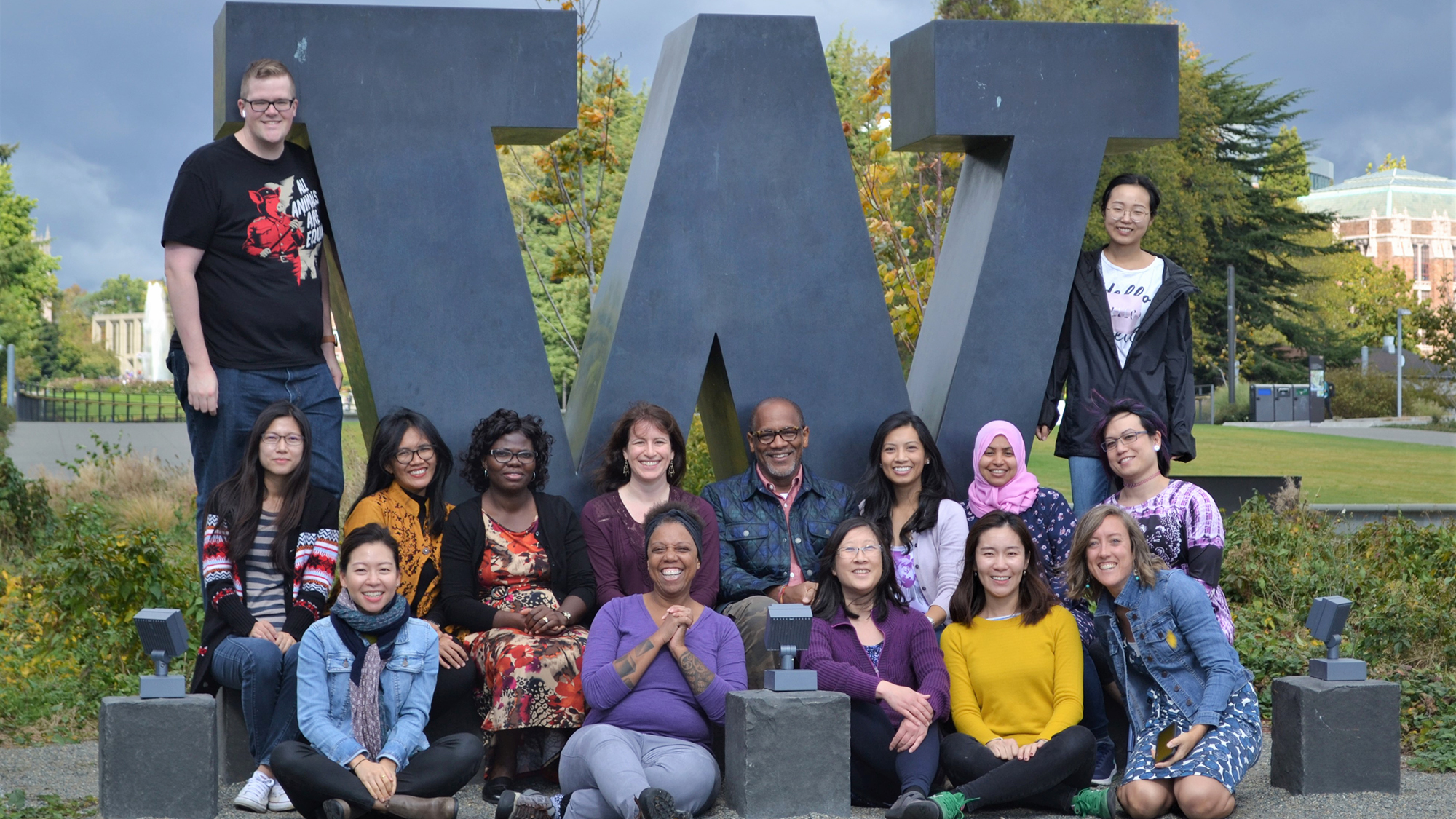 group of people in front of W