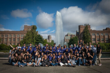 group shot of campers in front of fountain
