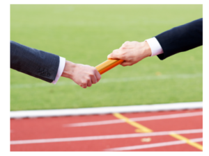 Hands passing a relay baton on a track, representing a smooth transition and continuity of services.